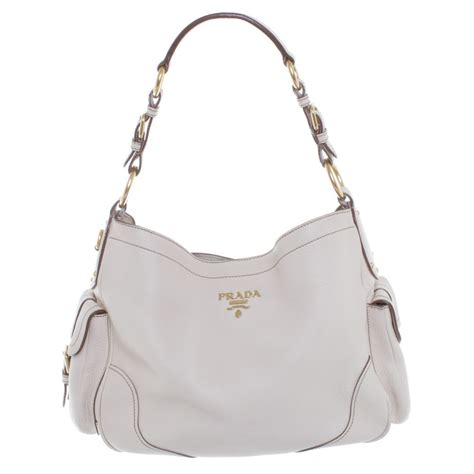 prada cream purse|prada purses near me.